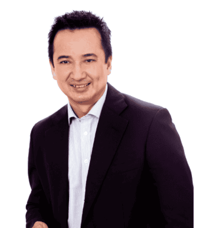 Professional man in business suit smiling on white background.